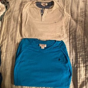 2 Penguin shirts. Barely worn.